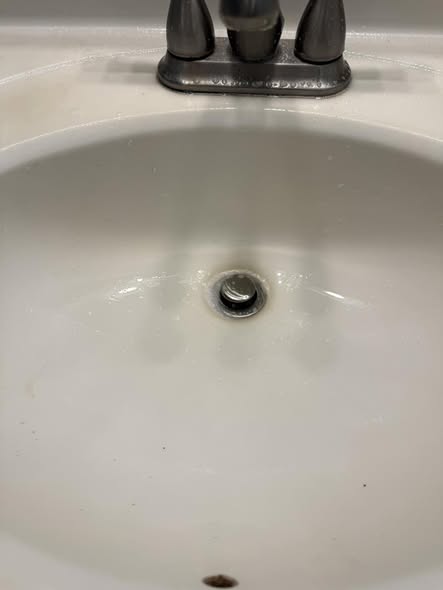 Clean bathroom sink after detail cleaning